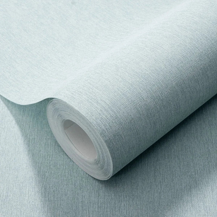 Flizelīna tapetes ar tekstila faktūru gaiši tirkīzā krāsā – svaigs un harmonisks sienu risinājums Erismann