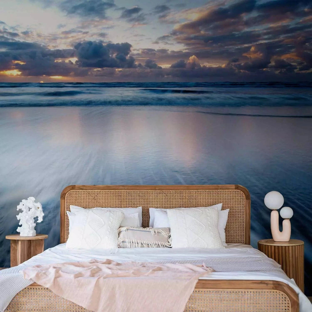 Fototapetes ar saulrietu virs zila okeāna - zilos toņos G-ART