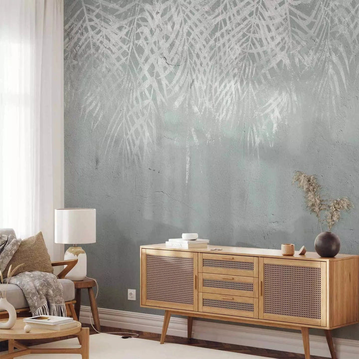 Fototapetes ar palmu lapām uz pelēka betona - mierīgai atmosferai G-ART