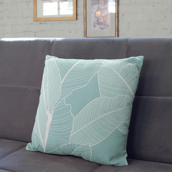 Dekoratīvas spilvendrānas, Kompozīcija ar fikusa lapām uz tirkīza fona G-art