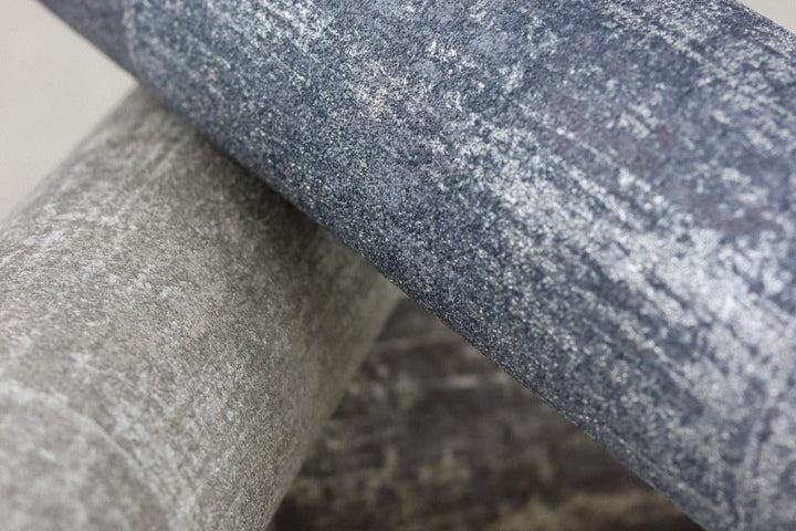 Tapetes RASCH ar grafisku rakstu un perlamutra efektu zilos toņos RASCH