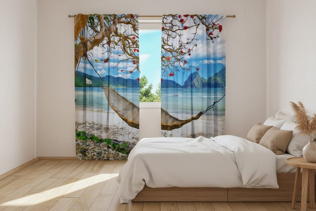 The living room interior features light-colored walls and a wooden floor. Photo curtains are hung on the window, featuring a photorealistic image of an exotic tropical beach.