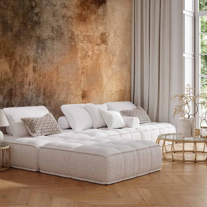Artistic photo wallpaper with an aged plaster and stone wall effect in brown, ochre, and terracotta tones with a distinctive vintage texture and color transitions.