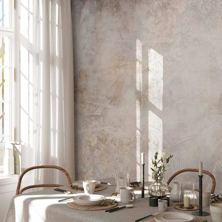 Wall mural with a vintage-style textured background in shades of gray and beige - in a sunny interior