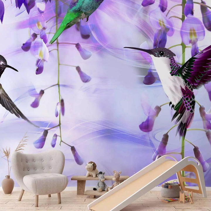 Fototapetes - Lidojoši kolibri starp ziediem violetā krāsā G-ART
