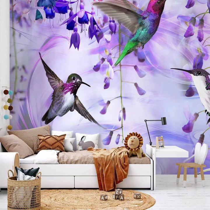 Fototapetes - Lidojoši kolibri starp ziediem violetā krāsā G-ART
