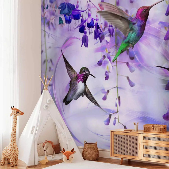 Fototapetes - Lidojoši kolibri starp ziediem violetā krāsā G-ART