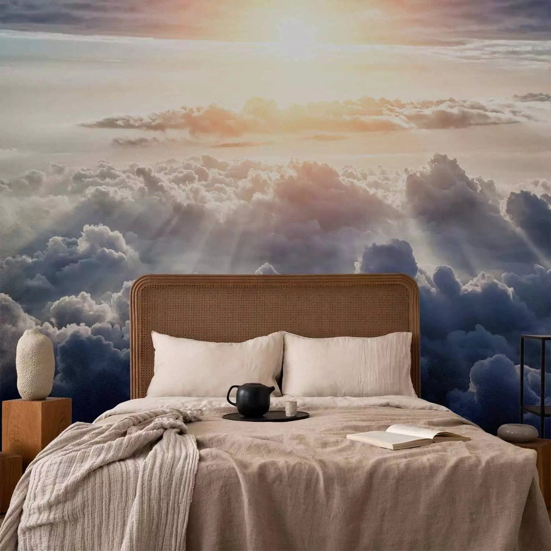 Fototapetes ar saulrietu virs mākoņiem - zilos toņos G-ART