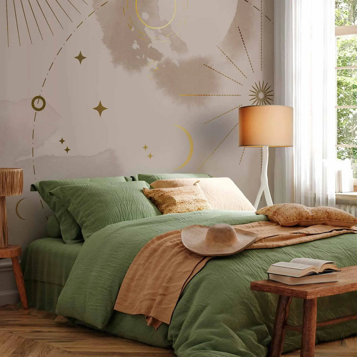 Абстрактные фотообои с золотыми фазами луны, звездами и символами солнца в мистическом стиле бохо в интерьере спальни
