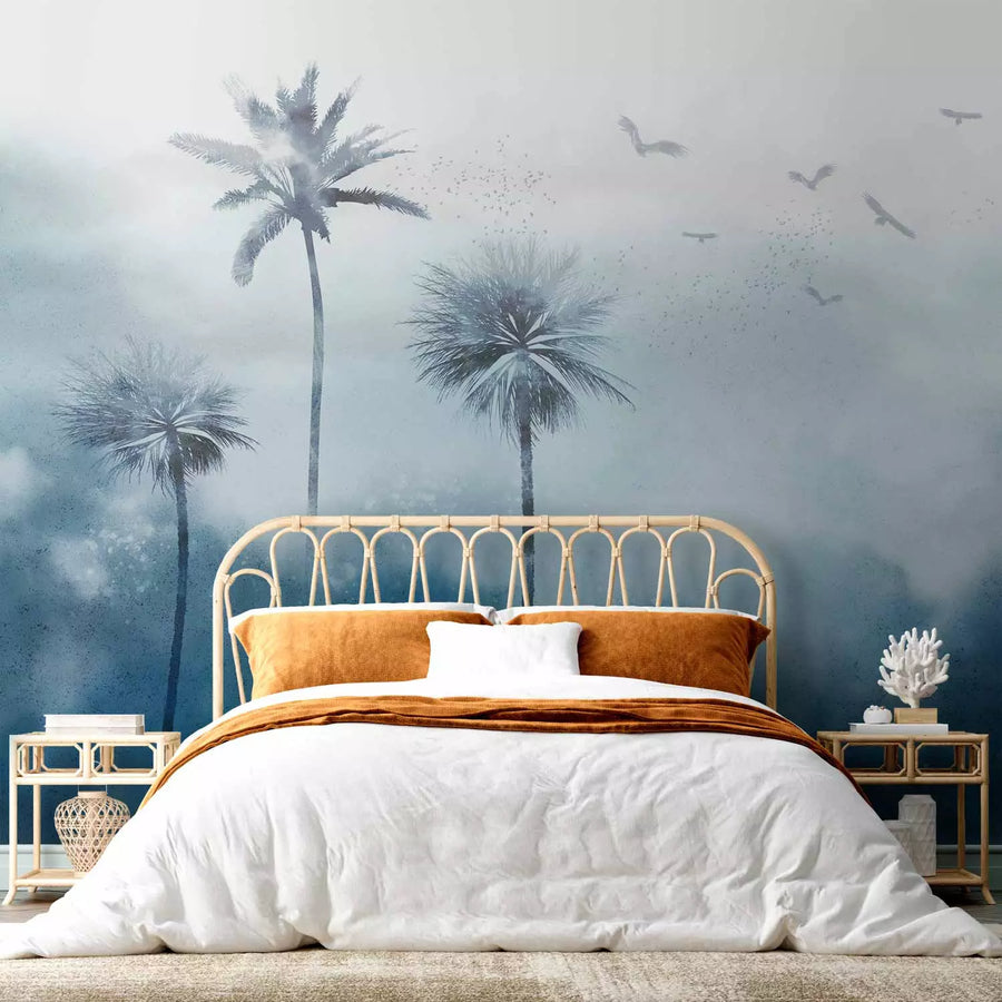 Fototapetes - Tropu brīze – mākoņaina ainava ar palmām un putniem zilā G-ART