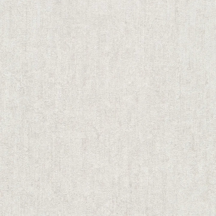 Close-up of a light gray wallpaper roll clearly showing a distinct plaster-effect relief texture for interior wall decor