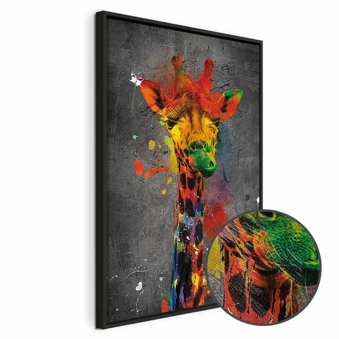 Framed canvas painting in a black frame with an expressive pop art style giraffe and color splashes 