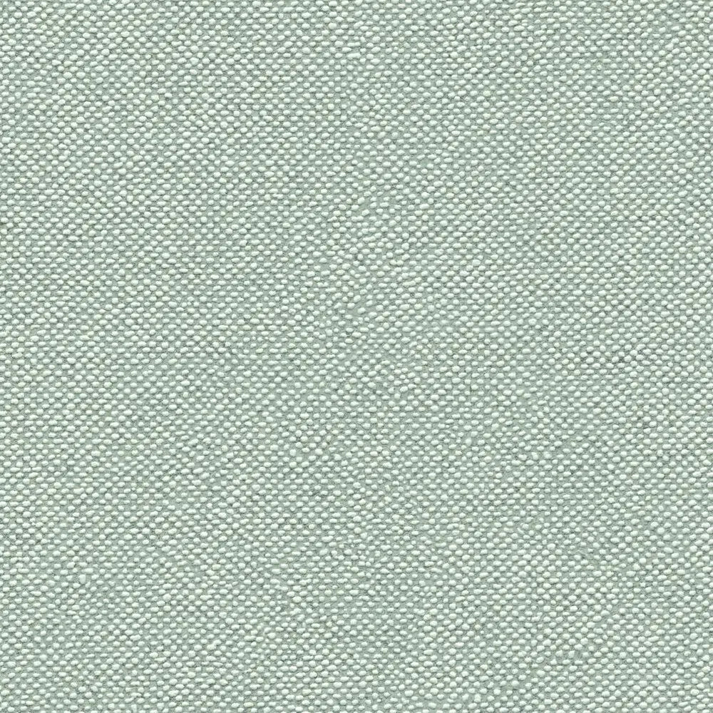 Mājīgu zaļu tapešu tuvplāns ar skaidri saskatāmu materiāla tekstūru. SKU: 3010674, AS Creation.