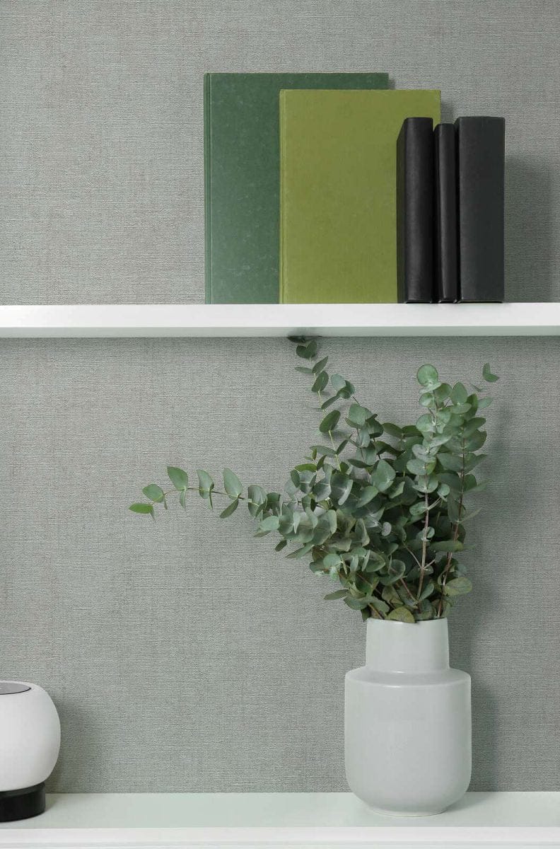 Grey Plain wallpapers with a light texture in a minimalist living room. SKU: 3012156, AS Creation.