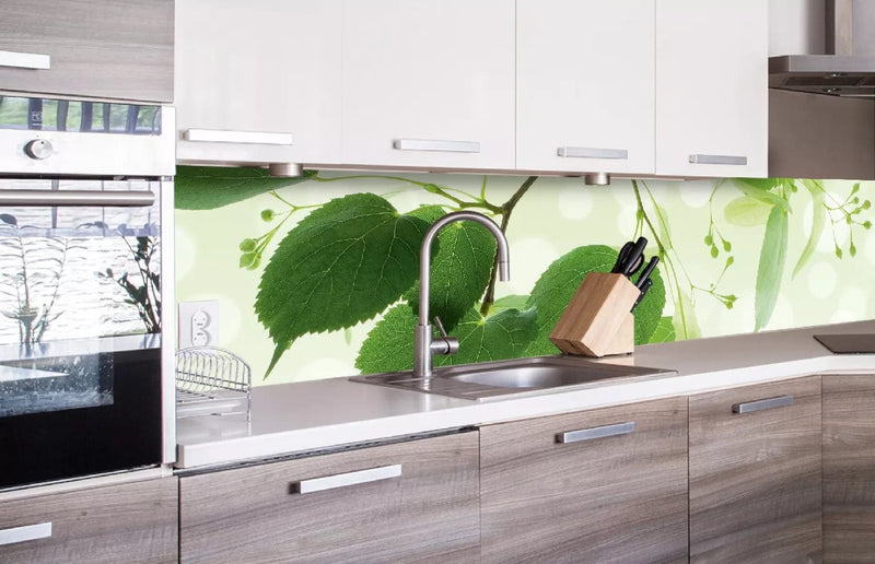 Fototapetes virtuvei ar lamināciju, pašlīmējošas plēve un flizelīns - Zaļās lapas  (260x60 cm) Art4home