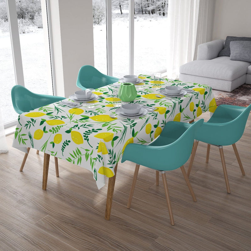 Tablecloth with lemons and green leaves