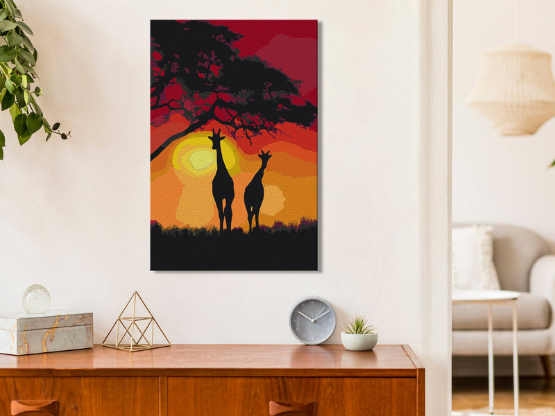 Kanva uz audekla "izkrāso pēc cipariem" - Giraffes and Sunset 40x60 cm Artgeist
